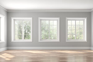 Classical Empty Room Interior 3d Render,the Rooms Have Wooden Floors And Gray Walls ,decorate With White Moulding,there Are White Window Looking Out To The Nature View.