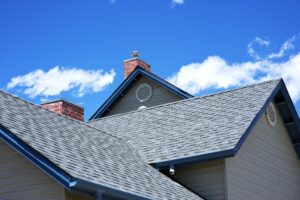 A close up view of a residential home with high quality shingles freshly installed